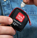 Cyclist wearing earplugs to protect from wind noise