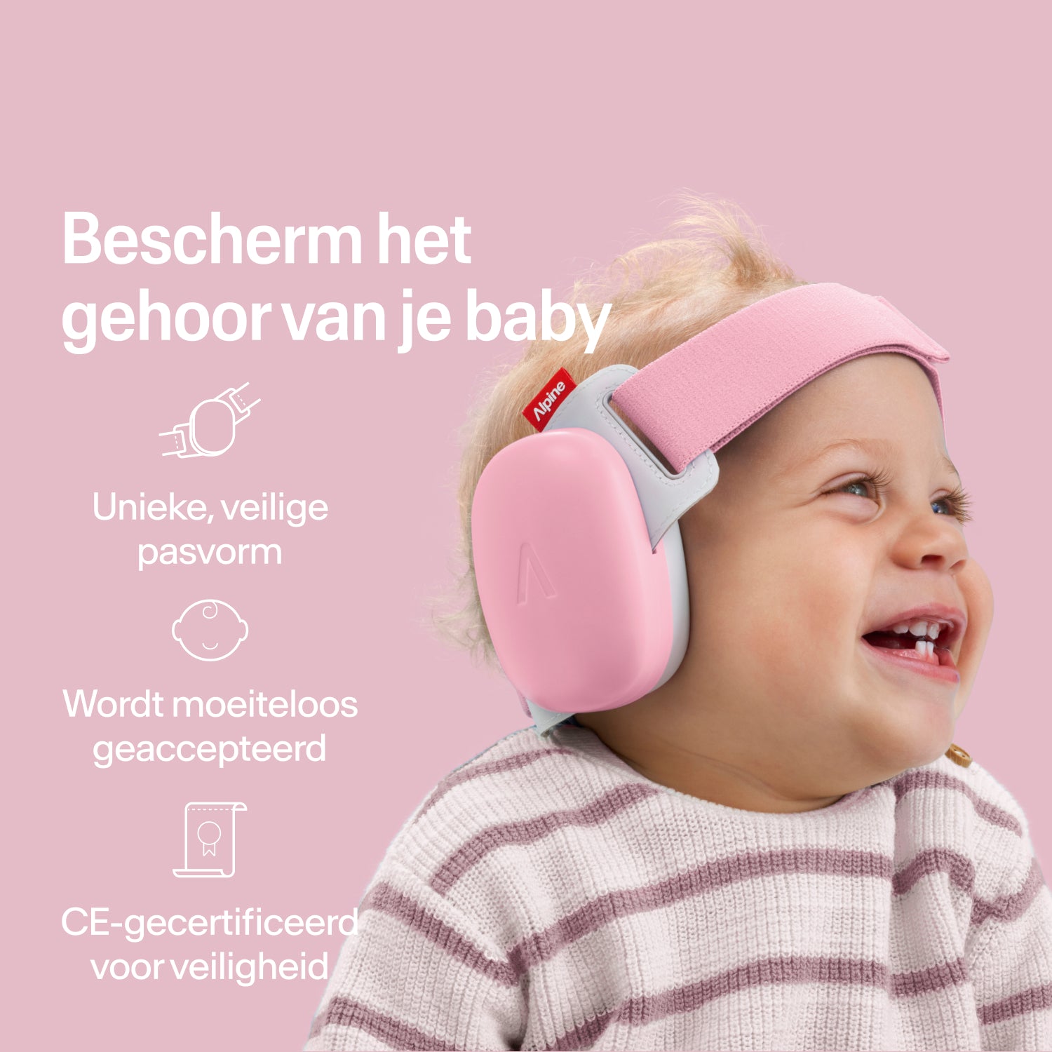 Blije baby draagt rose-pink Alpine oorkappen met stevige pasvorm, CE-gecertificeerde gehoorbescherming