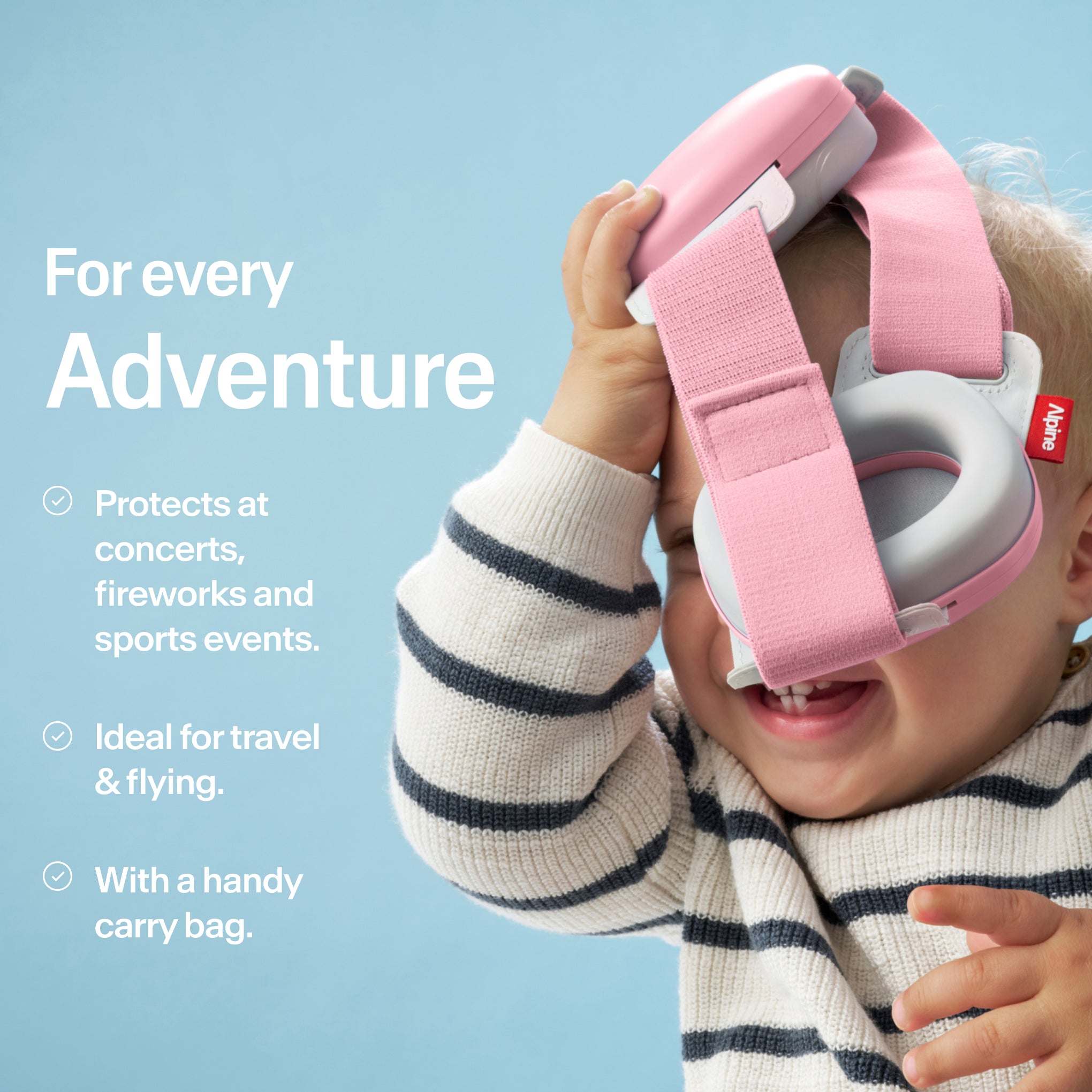 Baby holding Alpine Muffy Baby in rose pink in hand with USPs for use