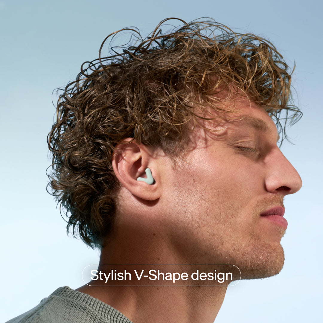 V-shape Alpine Silence earplugs in ear – green