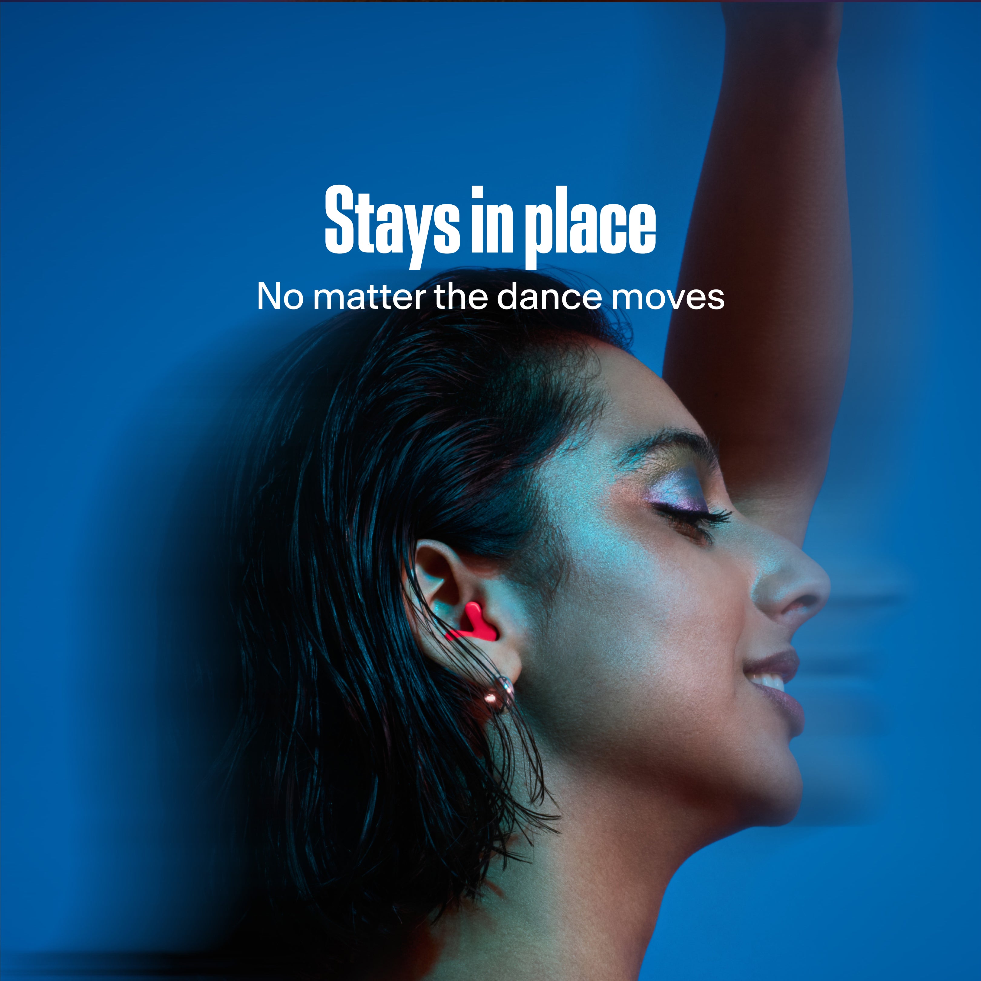 woman wearing alpine tune in neon-pink dancing with them