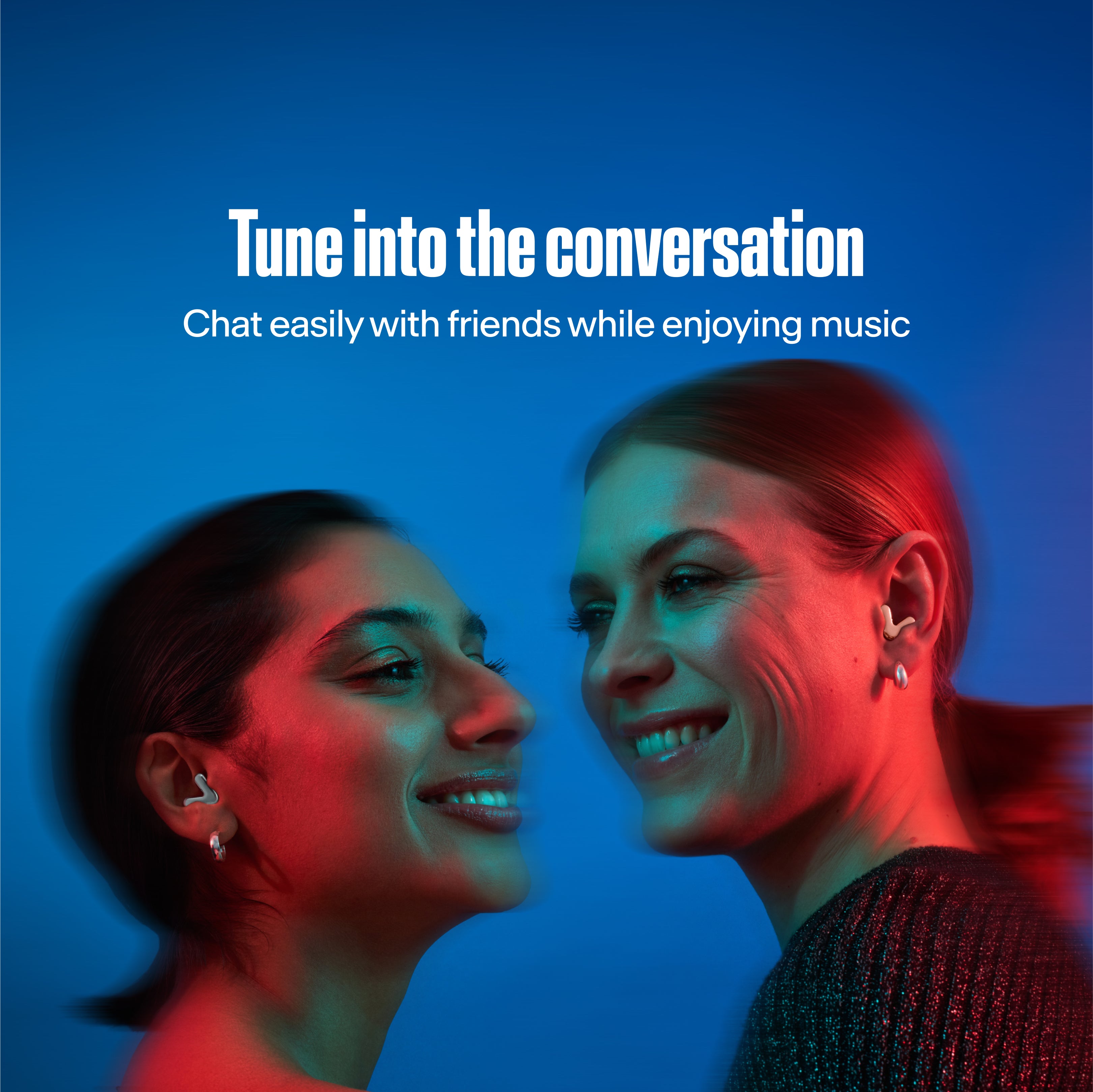 two woman with alpine tune in silver and rose gold enjoying music together